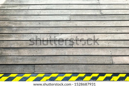 Wooden floors and warning signs