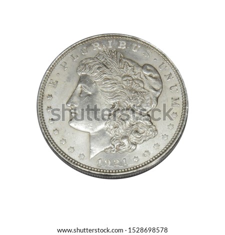 1921 Morgan Silver Dollar coin isolated on white background closeup. Shiny vintage collection object.