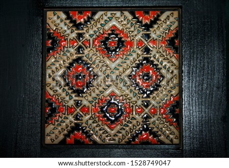 A multicolored artistic wall decoration designed from ceramic.
Ethnic Ceramic background.
Seamless pattern.