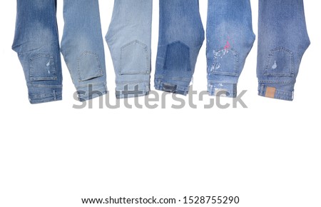 Jeans hang with copy space on bottom edge


