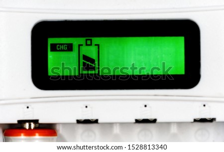 Battery Charging Process. Green Screen With Battery Indicator. battery charger Close Up