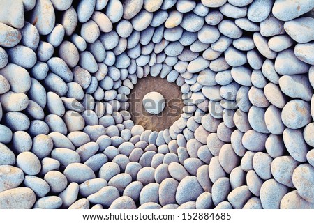 Sea stones laid out in the form of a circle Royalty-Free Stock Photo #152884685