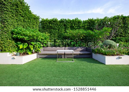 Modern Sofa and furniture on rooftop garden. Royalty-Free Stock Photo #1528851446