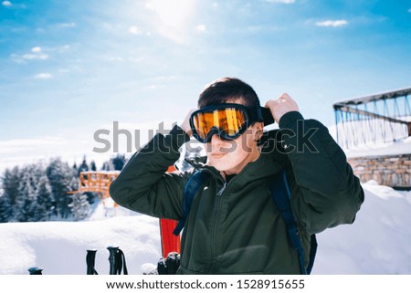 Portrait Of Skier Wearing His Goggles