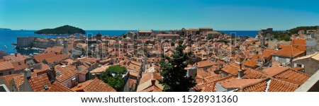 View over the roofs of Dubrovnik's old city. Dubrovnik is a Croatian city on the Adriatic Sea. It is one of the most prominent tourist destinations in the Mediterranean Sea