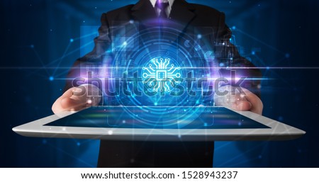Hand holding tablet with online security and data protection concept Royalty-Free Stock Photo #1528943237