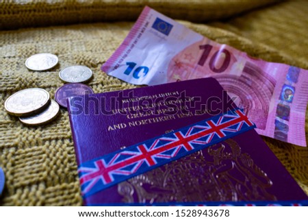 European Union United Kingdom of Great Britain and Northern Ireland burgundy passport on isolated  background. Brexit, no access, leaving EU, no deal, British government, union jack, Halloween concept Royalty-Free Stock Photo #1528943678