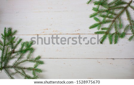 Old wood texture background surface. Wood texture table surface top view. Vintage wood texture background. Natural wood texture. Branches of spruce.  Christmas tree branches. copyspace