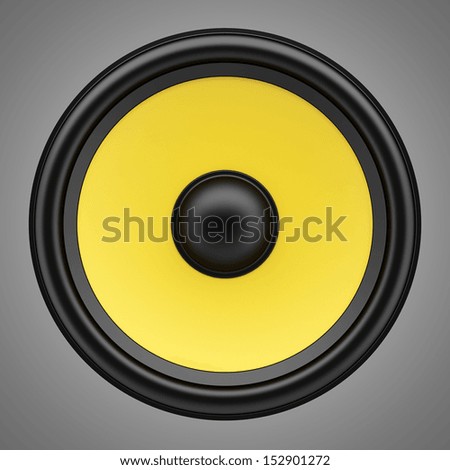 yellow loudspeaker isolated on gray background