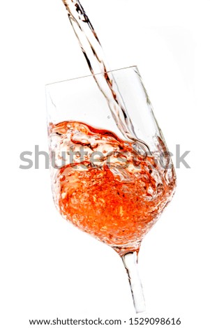 a glass of rose wine  isolated on white background