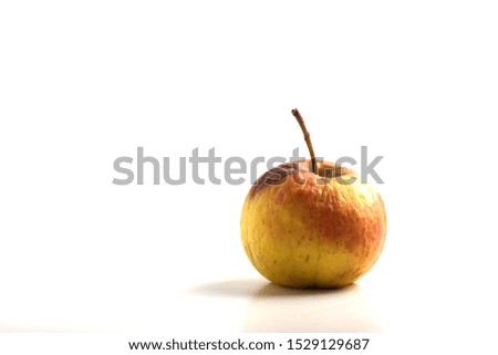 ugly apple isolated on white background