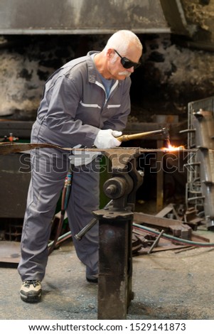 welder busy doing his work