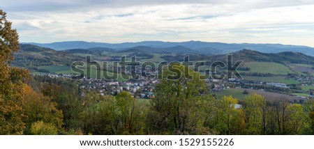 View of hilly terrain in wooded landscape