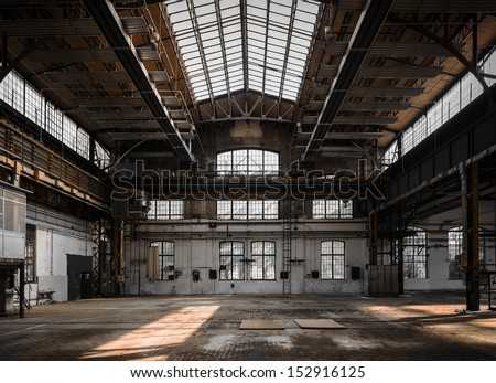 Industrial interior of an old factory building Royalty-Free Stock Photo #152916125