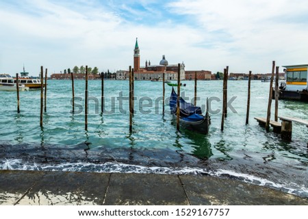 View of a gondola and in the background the island of Giudecca