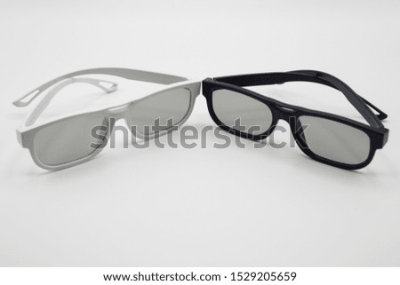 Black and white glasses to watch 3D cinema
