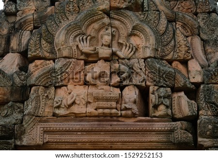 Engraving hindu god about ramayana story in The Phanon-rung stone castle in Buri-ram province Thailand about Buddhist century 15.