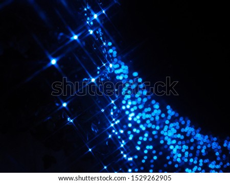 christmas blue  twinkle illuminations in the night Royalty-Free Stock Photo #1529262905
