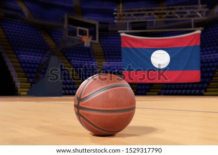 Laos flag and basketball on Court Floor