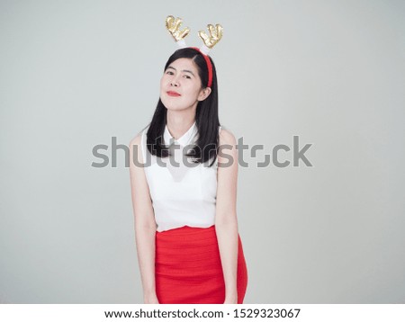 Portrait of beautiful woman asian girl and happy in costume celebrate christmas on white background.