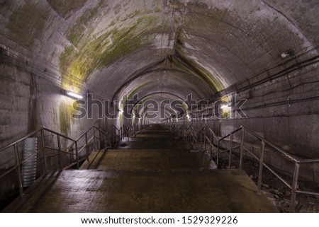It is a tunnel that leads to the underground platform of the Joetsu Line Dogo Station at the foot of Mt. Tanigawa in Gunma Prefecture. There are 462 stairs leading to the home. Royalty-Free Stock Photo #1529329226