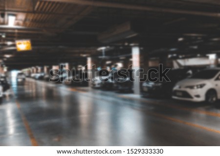 Abstract blurred parking lot in the building. Used as a product background image