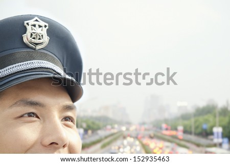 Police officer, half face, portrait