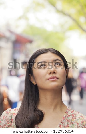 Young Woman looking up