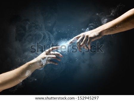 Michelangelo God's touch. Close up of human hands touching with fingers Royalty-Free Stock Photo #152945297