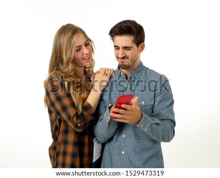 Young tourist couple consulting online travel guide blog or web on smart phone searching for locations and information. Travel industry and online app advertising style image isolated on white.