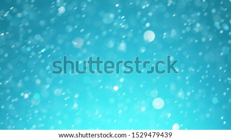 Abstract blue glittering background with blur dots.