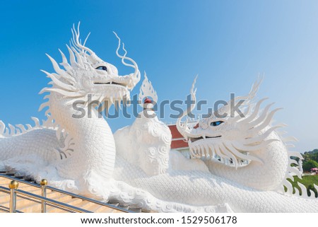 Beautiful Big White Dragon at Wat Huay Pla Kang Buddhist Temple. Landmark of Chiang Rai. Located in Thailand. Picture for Chiang Rai Travel Concept.