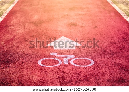 Bicycle path sign on the asphalt 