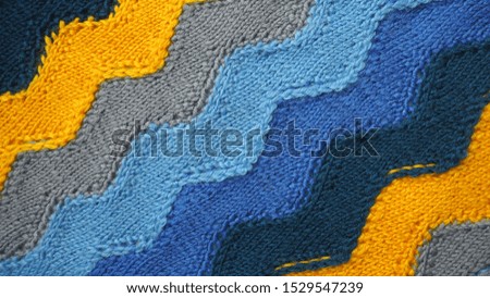 Hand knitted texture of sea color