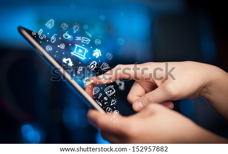 Hand touching tablet pc, social media concept Royalty-Free Stock Photo #152957882