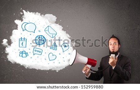 Young man shouting into loudspeaker and modern blue icons and symbols come out