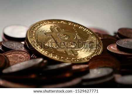 Tangible bitcoin made from metal. Royalty-Free Stock Photo #1529627771