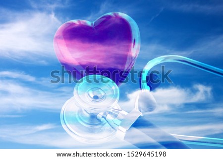 Health red heart with stethoscope on sky background close up