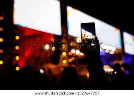 Silhouette of a smartphone in the hands. Stage record video