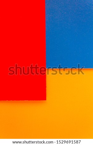 Picture in the form of a set of multi-colored squares and rectangles with natural paper.