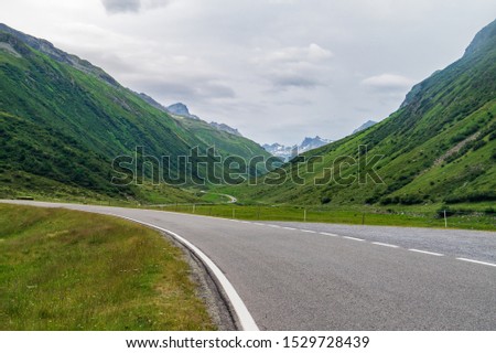 Scenic road Silvretta high Alpine route with green mountains, Austrian Alps

