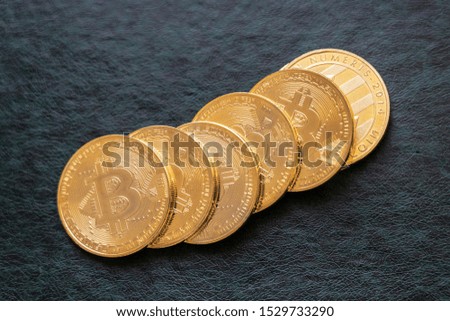 Bitcoin coins cryptocurrency on dark background, financial conceptual image