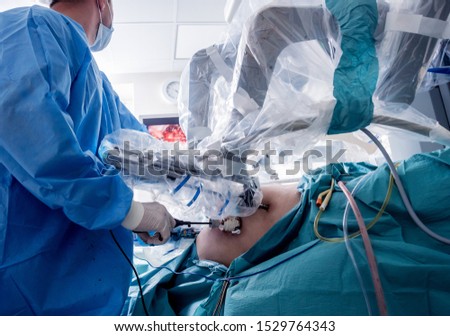 Modern surgical system. Medical robot. Minimally invasive robotic surgery. Medical background Royalty-Free Stock Photo #1529764343
