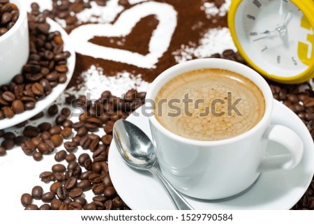 cup of espresso, heart and coffee beans conceptual photography, closeup horizontal