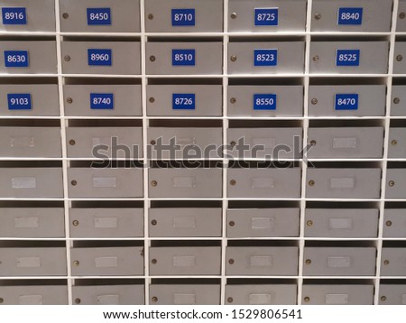 postbox in condominium., Mailboxes in the condo. wooden mailbox with lockable center in condo.