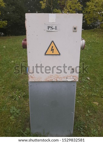 electric panel with the caution warning sign