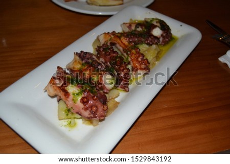 Delicious octopus dish with potatoes