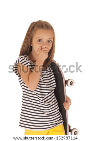 Young Girl holding skateboard and cute expression