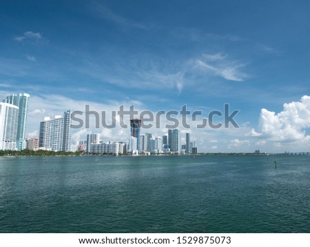 view of Miami downtown skyline at sunny and cloudy day with amazing architecture