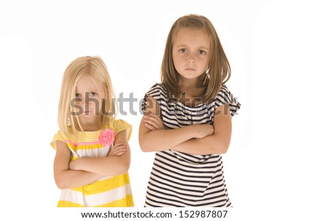 two young girls angry at each other